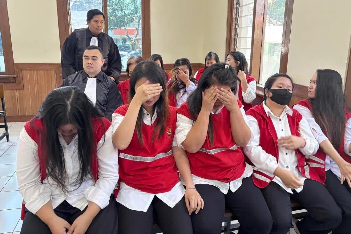 Indonesian court sentences all 19 members of baby-smuggling ring that trafficked infants to Singapore