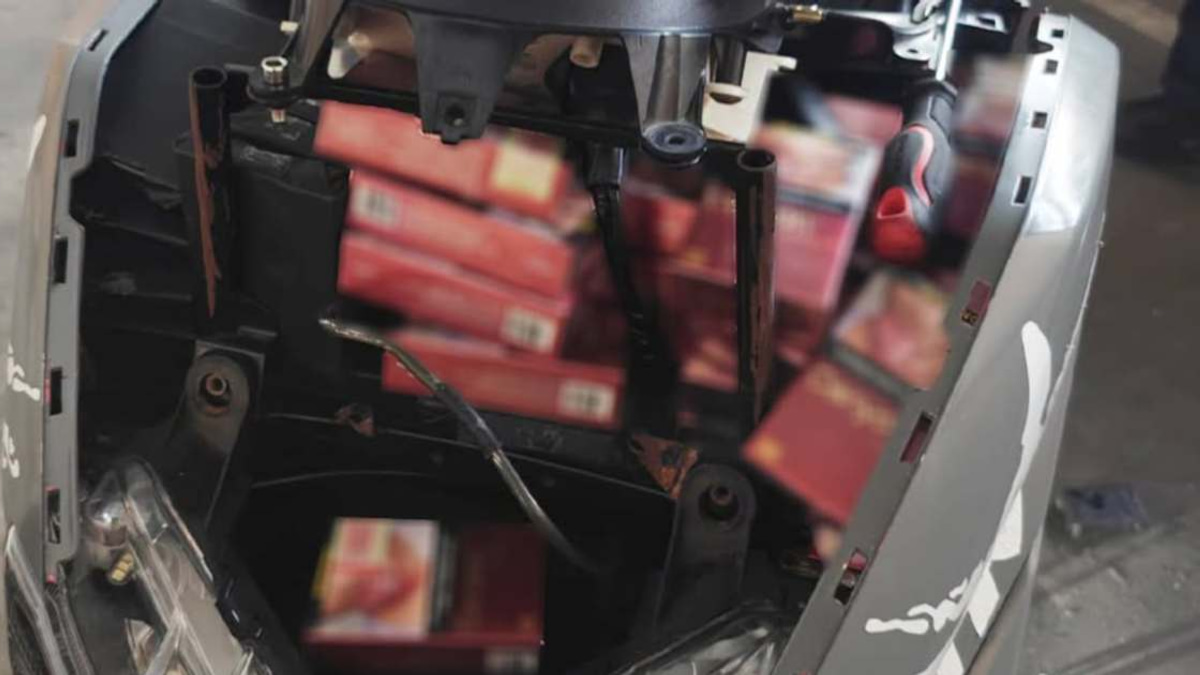Woman Arrested at Tuas Checkpoint with Hidden Cigarette Haul on Motorcycle