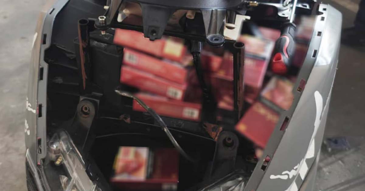 Woman Arrested at Tuas Checkpoint with Hidden Cigarette Haul on Motorcycle