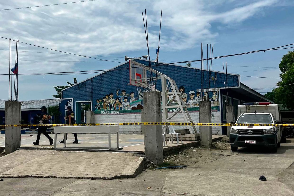Two teenage shooters open fire at Philippine high school, killing three students