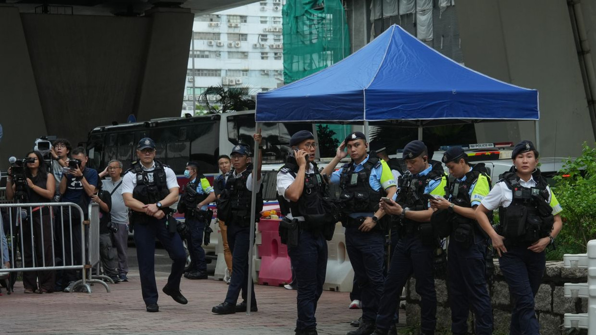 Hong Kong Woman Arrested for Seditious T-Shirt as Democracy Trial Concludes