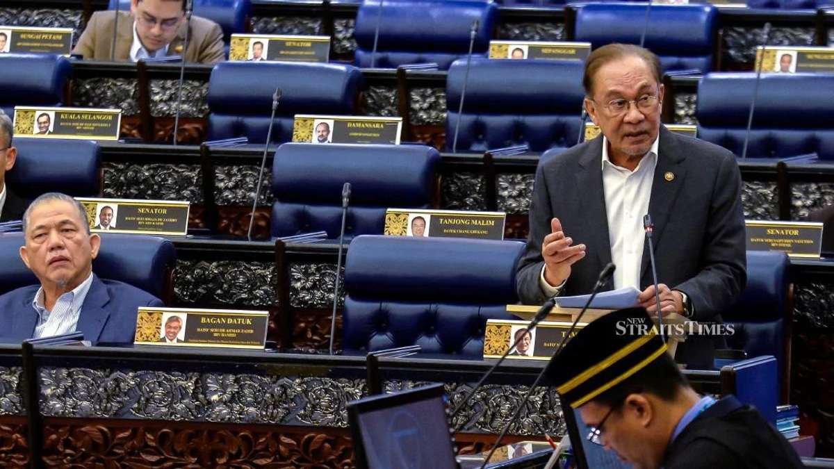 E-wallet operators must compensate scam victims, PM Anwar says