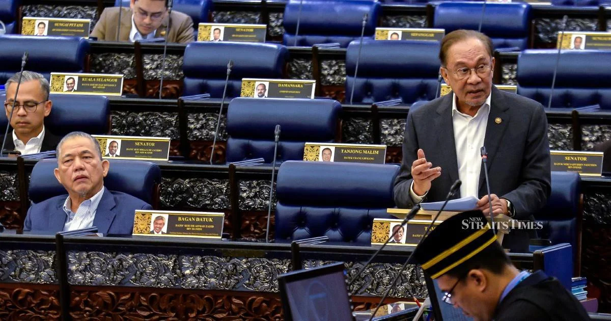 E-wallet operators must compensate scam victims, PM Anwar says