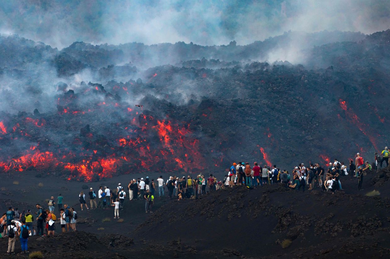 Mount Etna's Fiery Display Lures Throngs of Tourists Despite Safety Warnings