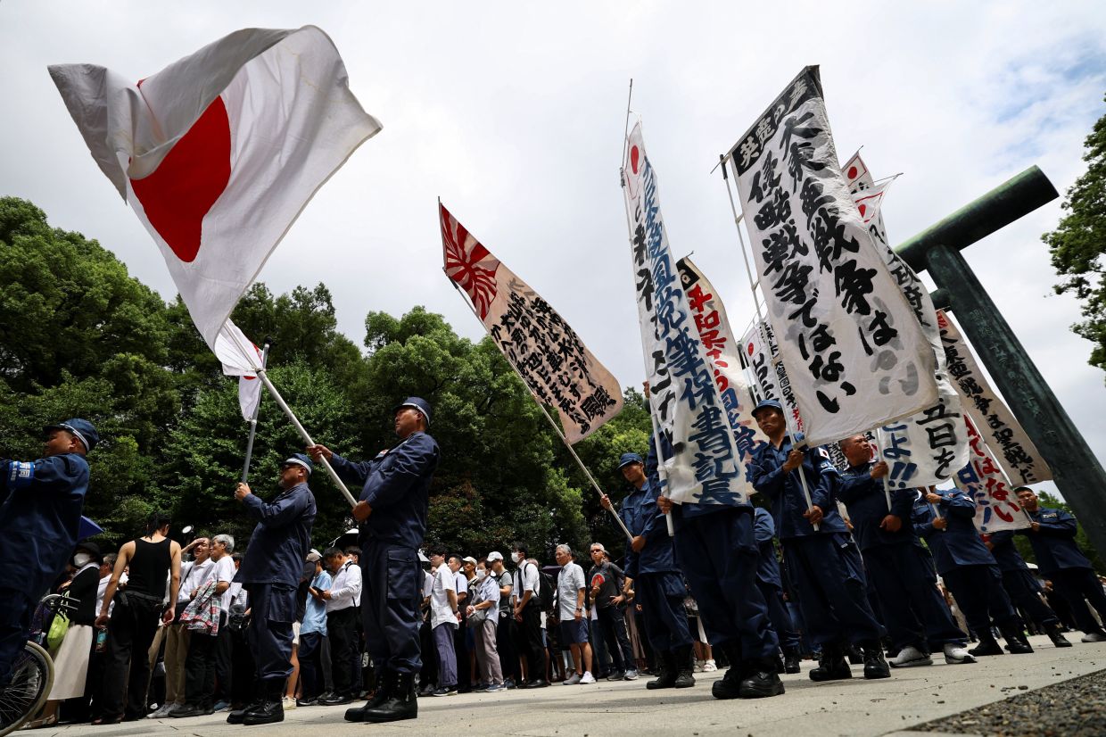 Japan's Defence Minister Visits Controversial War Shrine as PM Takes Distance