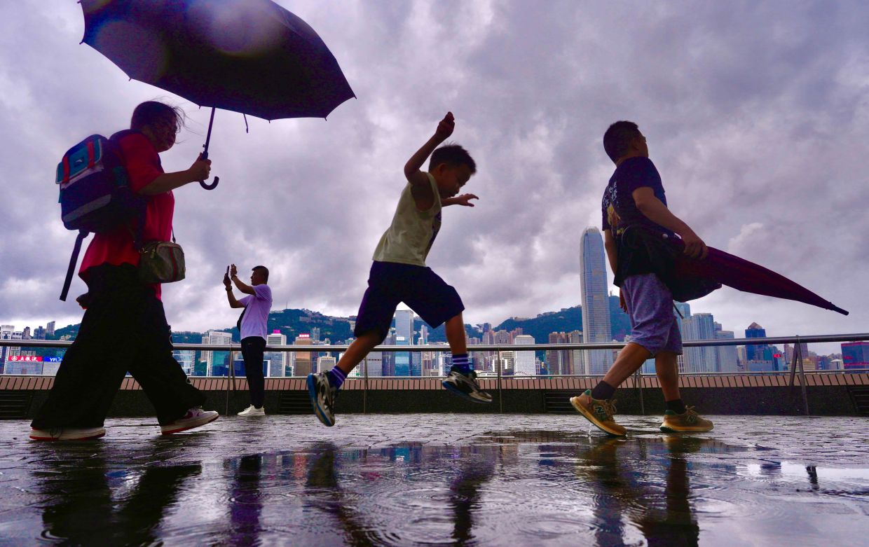 Hong Kong finds respite as rain breaks intense summer heat wave