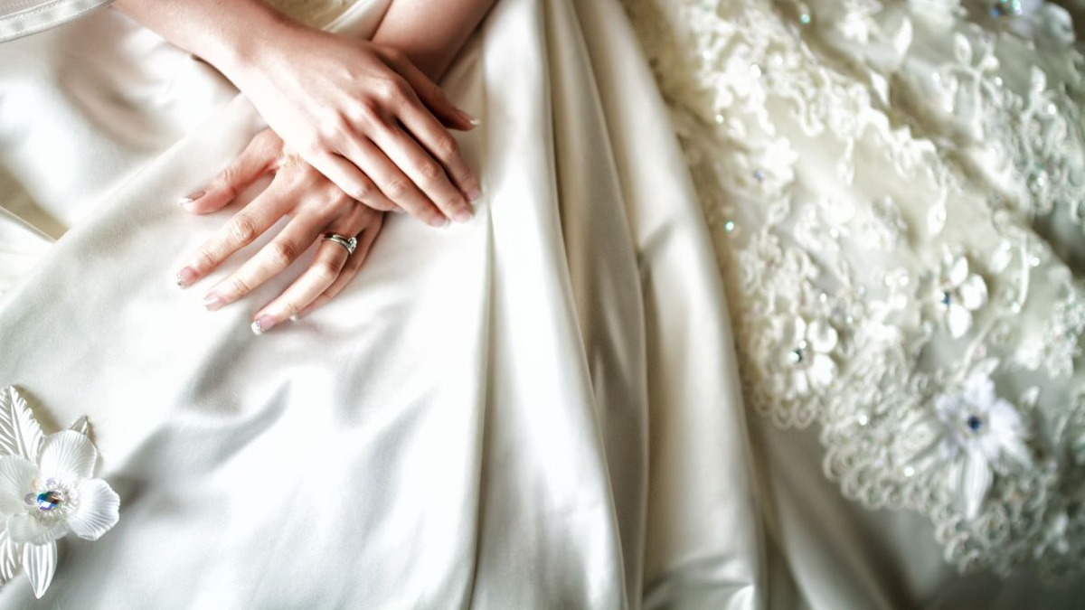 The emotional weight of letting go: why wedding dresses hold so much more than fabric and sentiment