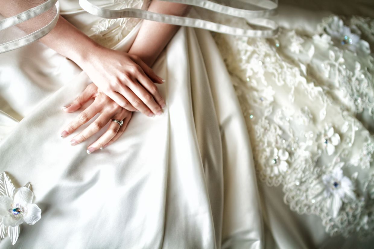 The emotional weight of letting go: why wedding dresses hold so much more than fabric and sentiment