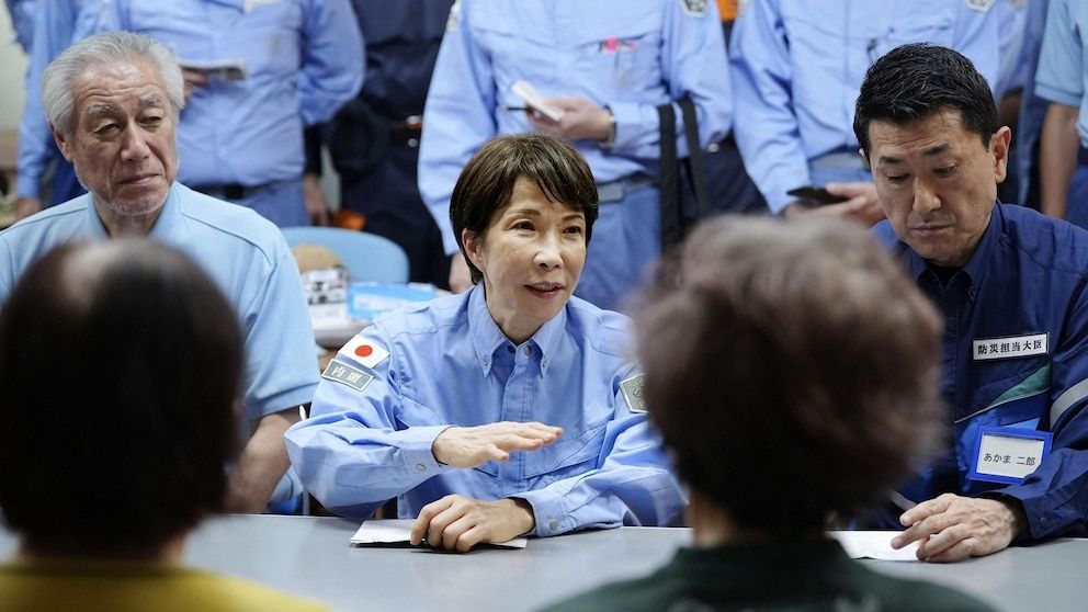Japan's PM visits earthquake zone as heat and water shortages compound disaster recovery