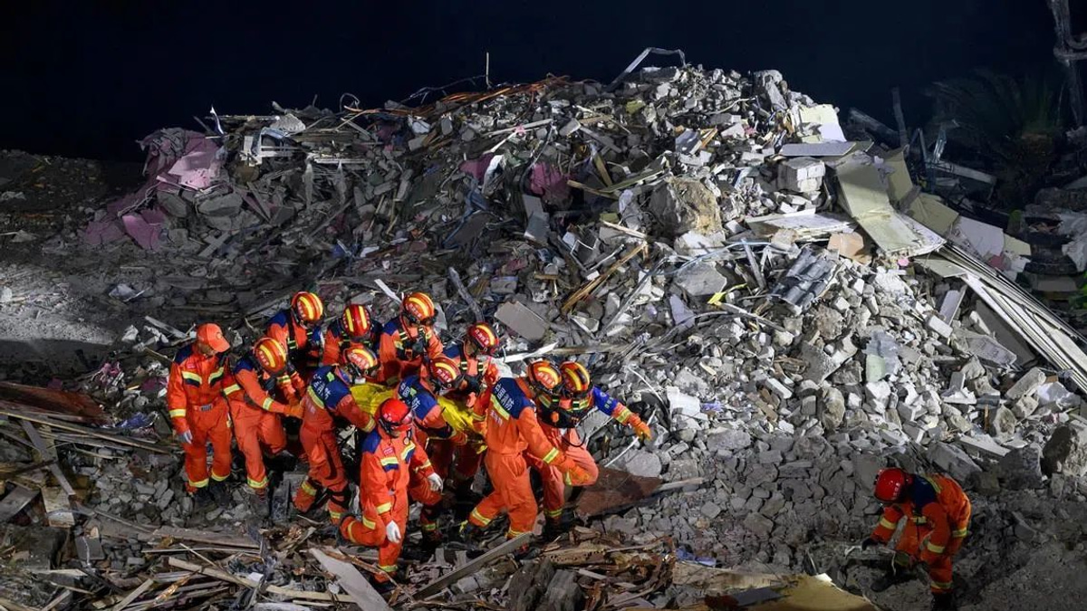 Chinese rescue teams blast through boulders to reach 34 missing after landslide