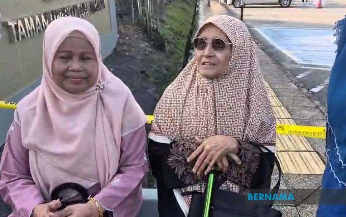 Elderly Voters Defy Weather to Cast Ballots in Johor State Election