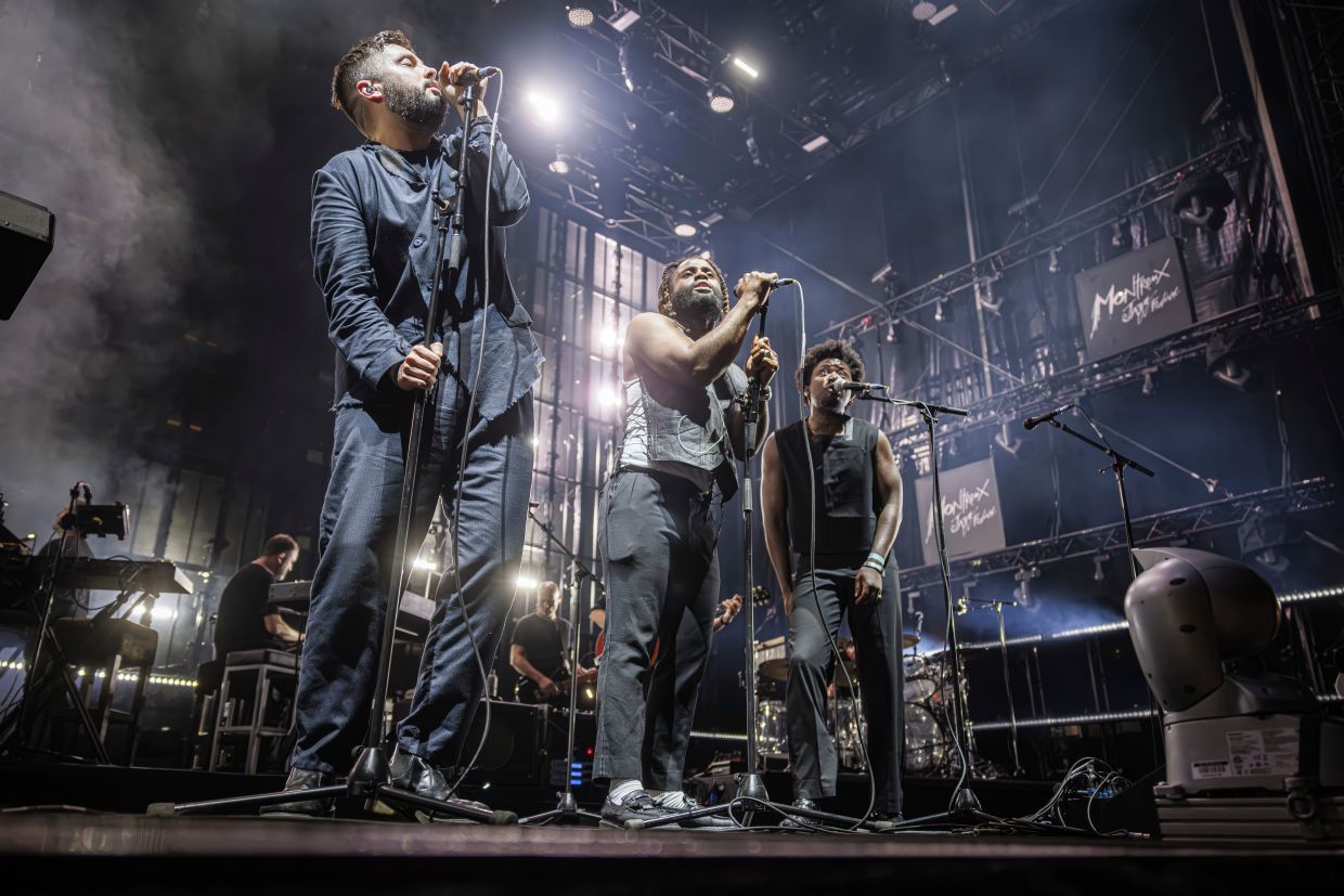 Massive Attack says Singapore police detained and questioned band members after Palestinian flag display at concert