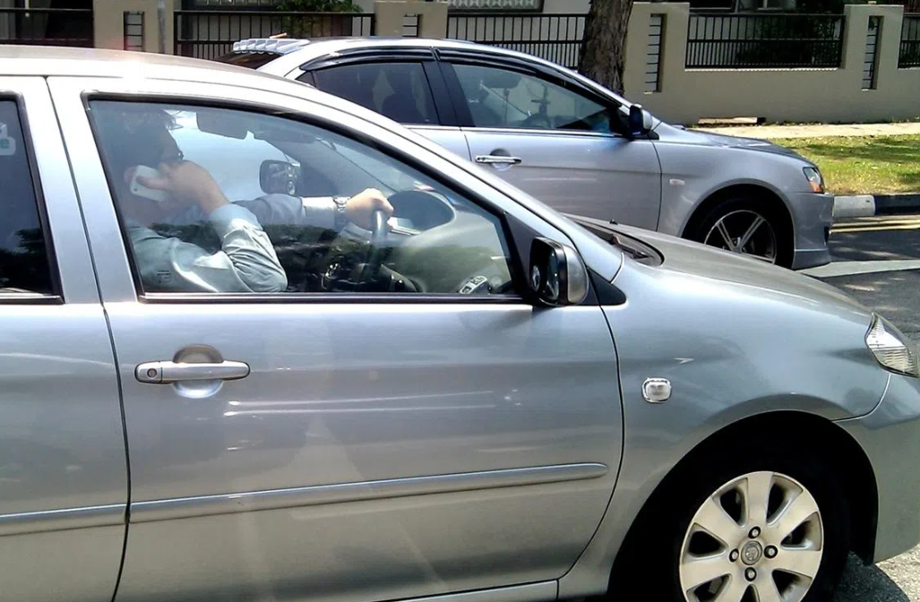 Singapore to Penalise Drivers Merely Holding Phones, Introduce Harsher Vehicle Endangerment Laws