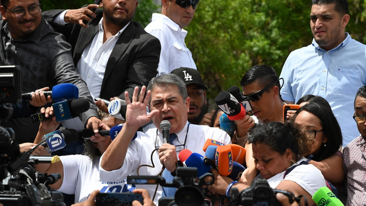 Honduran ex-president granted freedom to face corruption charges after Trump pardon