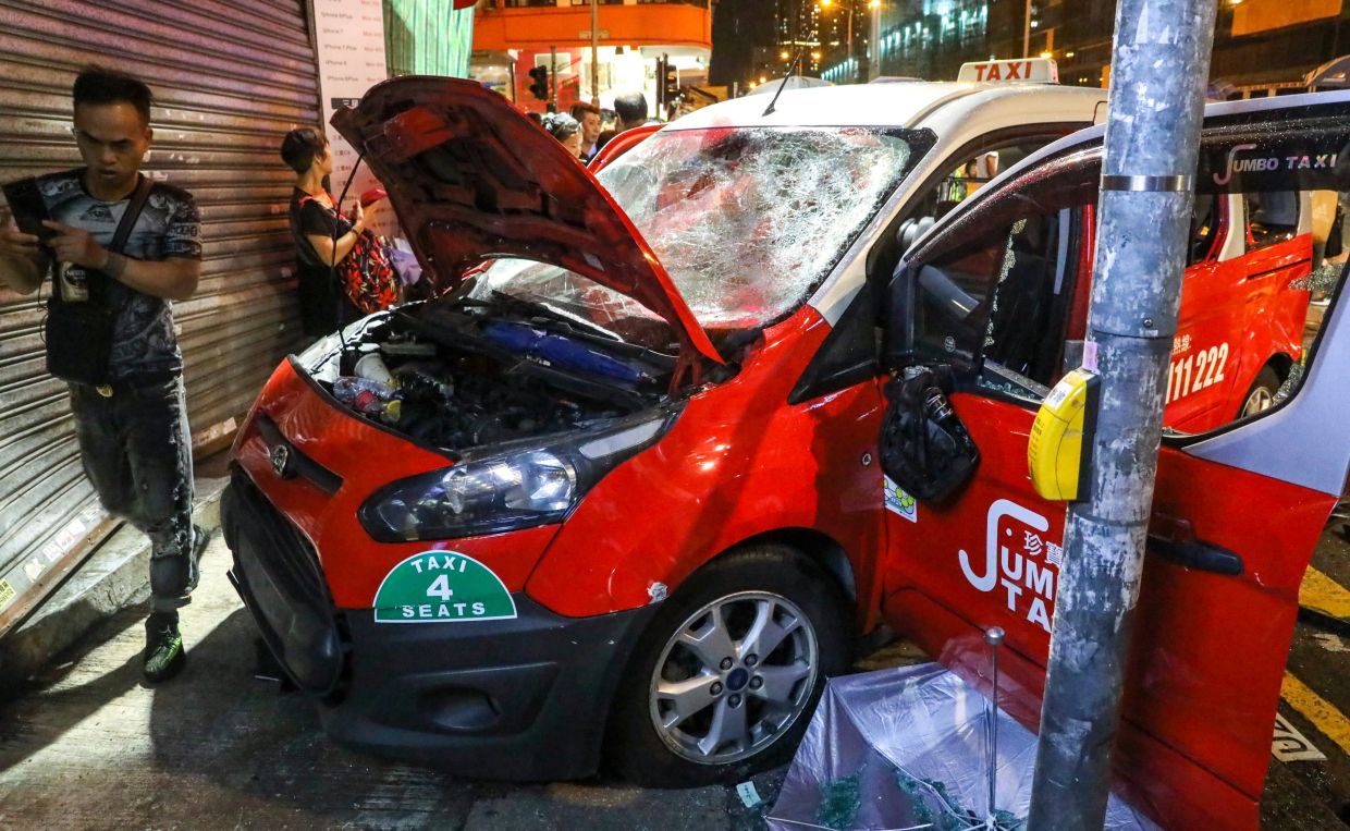 Hong Kong Woman Seeks HK$8.4 Million from Taxi Driver Over 2019 Protest Injuries