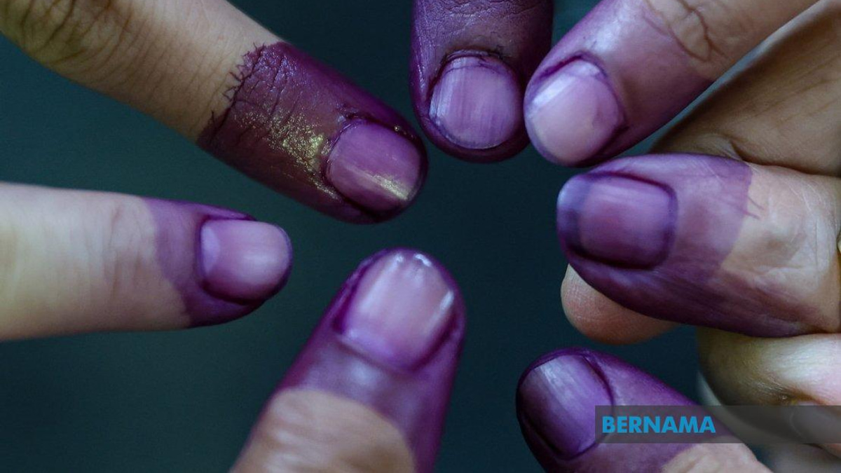 Johor's Election Day: Purple-Stained Fingers Unlock Food and Beverage Rewards