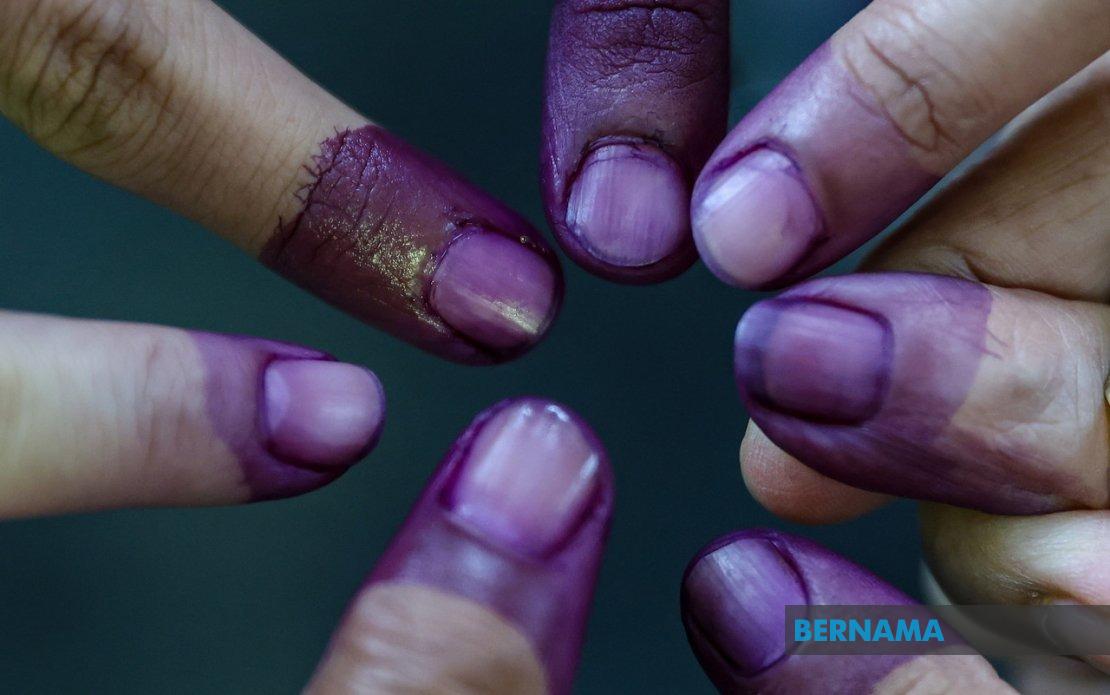 Johor's Election Day: Purple-Stained Fingers Unlock Food and Beverage Rewards