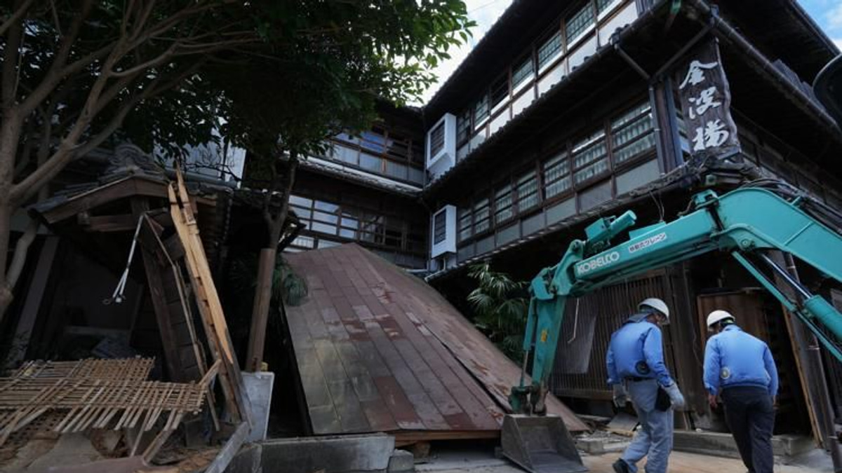 Heat and hardship compound Japan's earthquake crisis as death toll rises to 36