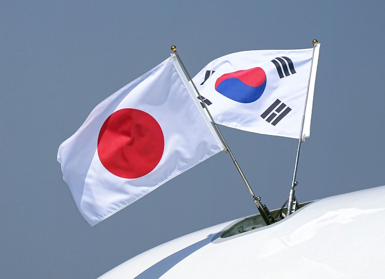 Nuclear dominoes in Asia: how one Korean or Japanese bomb could trigger a cascade