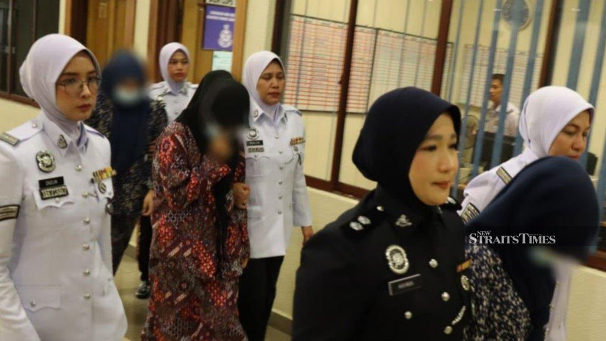 Three women face court over dangerous 'Superman' motorcycle stunt in Kuantan