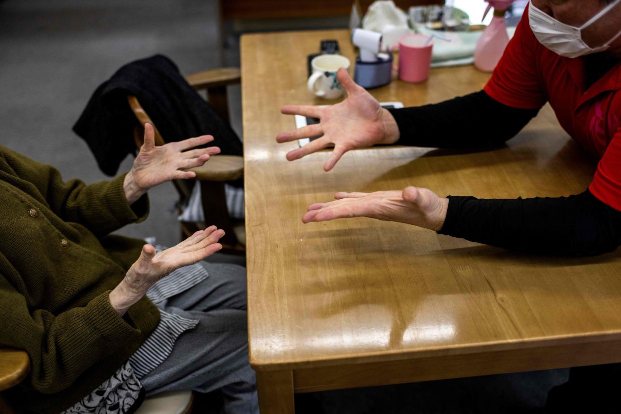 Japanese Doctor's Provocative Novel on Elderly Care Sparks Debate Over Amputation Ethics